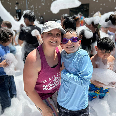 Mother and son enjoy the outside foam part at the Hudson Public Library